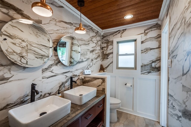 9923 Harwell Dr, Dallas, TX 75220 - bathroom featuring wooden ceiling, double vanity, and toilet