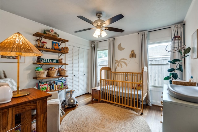 9923 Harwell Dr, Dallas, TX 75220 - bedroom featuring a sink, wood finished floors, and a ceiling fan