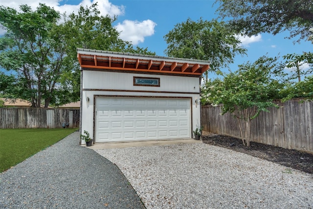 9923 Harwell Dr, Dallas, TX 75220 - garage featuring gravel driveway