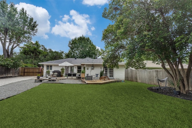 9923 Harwell Dr, Dallas, TX 75220 - rear view of house featuring french doors, brick siding, and a patio area