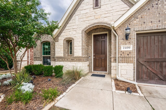 2409 Valley Ln, Carrollton, TX 75010 - entrance to property with stone siding and brick siding