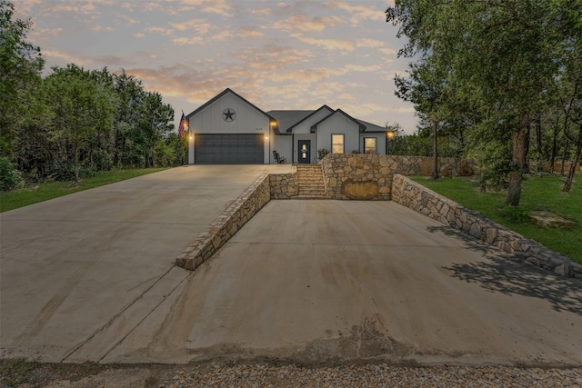 3228 Lakeside Dr, Granbury, TX 76048 - view of front of home featuring an attached garage and concrete driveway