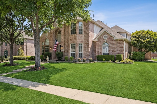 5754 Gadwall Dr, Frisco, TX 75034 - view of front of home featuring a front yard and brick siding
