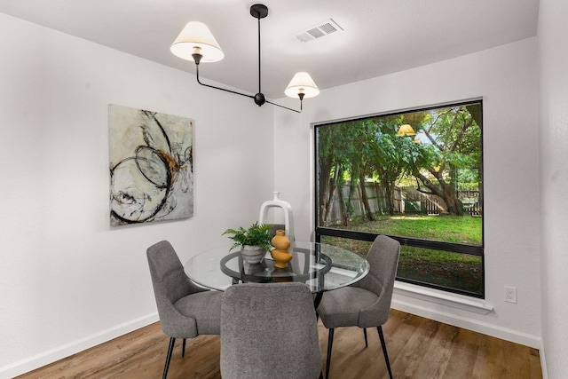 4028 Buckwheat St, Fort Worth, TX 76137 - dining area featuring baseboards and wood finished floors