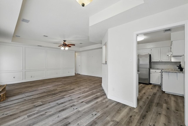 7616 Teresa Ct, North Richland Hills, TX 76182 - unfurnished living room featuring ceiling fan and wood finished floors