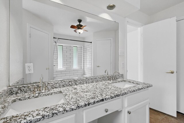7616 Teresa Ct, North Richland Hills, TX 76182 - bathroom with double vanity, a ceiling fan, tile patterned flooring, and a shower