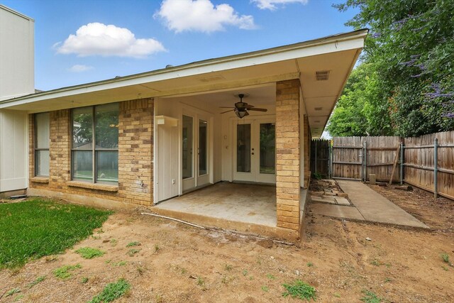 7616 Teresa Ct, North Richland Hills, TX 76182 - back of house with brick siding, a patio, a ceiling fan, and french doors
