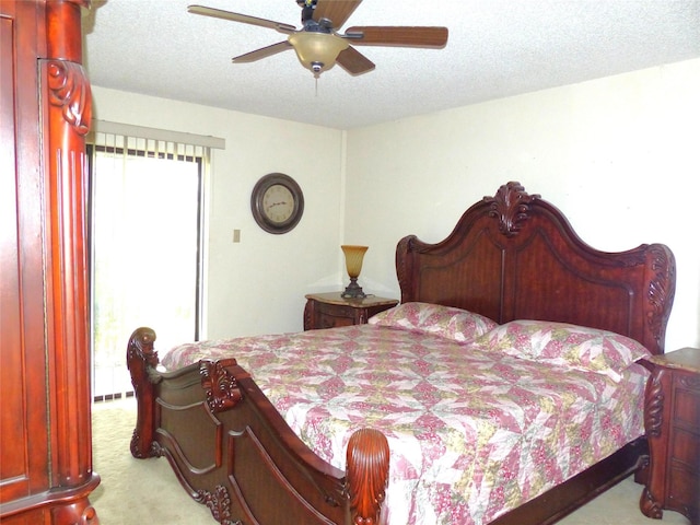 135 Lakeview, Brady, TX 76825 - bedroom with carpet floors, a textured ceiling, and ceiling fan