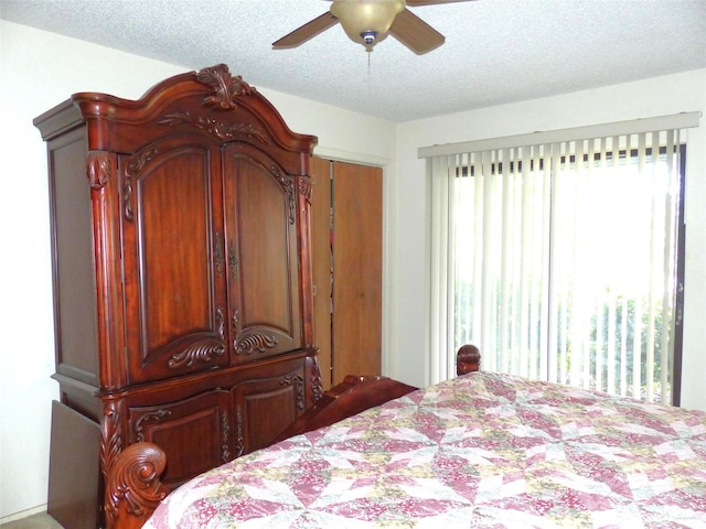 135 Lakeview, Brady, TX 76825 - bedroom with a textured ceiling and a ceiling fan