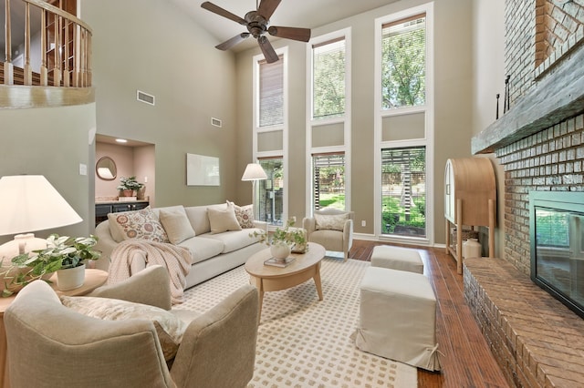 1610 Ottinger Rd, Keller, TX 76262 - living room with a fireplace, high vaulted ceiling, a ceiling fan, and wood finished floors