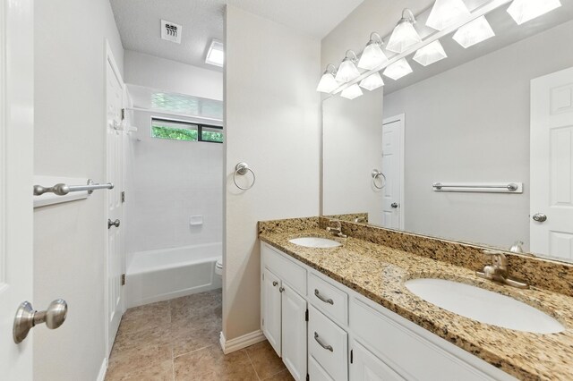 1610 Ottinger Rd, Keller, TX 76262 - bathroom featuring double vanity, tile patterned flooring, and bathing tub / shower combination