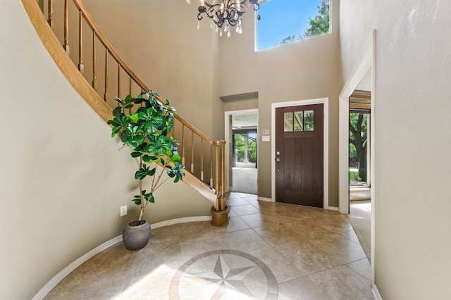 1610 Ottinger Rd, Keller, TX 76262 - entrance foyer with stairway, a chandelier, a towering ceiling, and light tile patterned floors