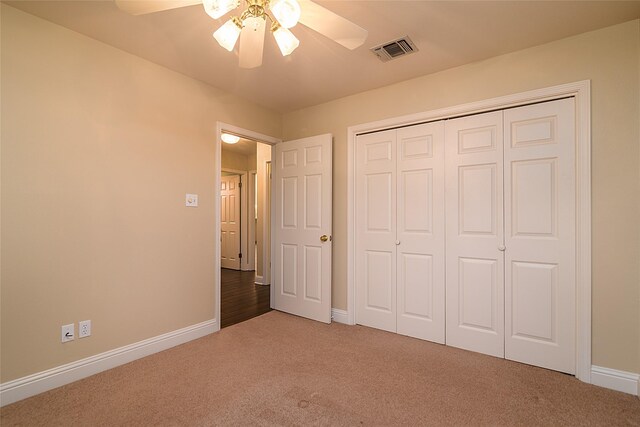 108 Arbor Ln, Shreveport, LA 71115 - unfurnished bedroom with carpet floors, baseboards, a closet, and ceiling fan