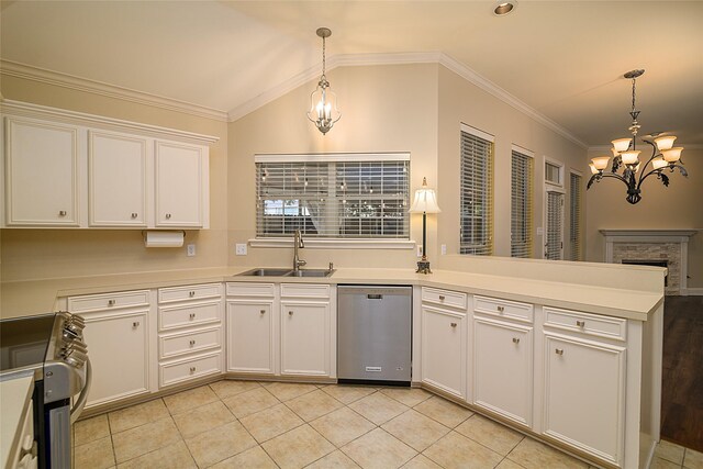 108 Arbor Ln, Shreveport, LA 71115 - kitchen with appliances with stainless steel finishes, a sink, a chandelier, a peninsula, and light countertops