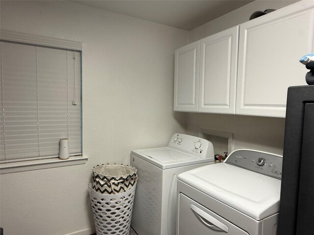 4 Preston Pl, Mineral Wells, TX 76067 - laundry room with cabinet space, washing machine and clothes dryer, and baseboards