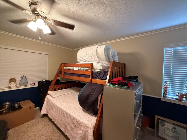 4 Preston Pl, Mineral Wells, TX 76067 - carpeted bedroom featuring ornamental molding, a ceiling fan, and a textured ceiling