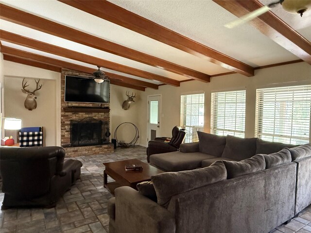 4 Preston Pl, Mineral Wells, TX 76067 - living area featuring a ceiling fan and a fireplace