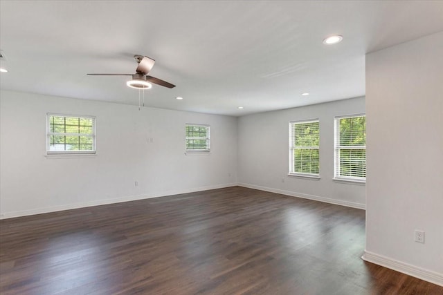 523 Hill Ave, Pittsburg, TX 75686 - empty room with plenty of natural light, ceiling fan, baseboards, recessed lighting, and dark wood-style flooring