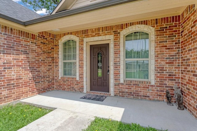 523 Hill Ave, Pittsburg, TX 75686 - property entrance featuring brick siding