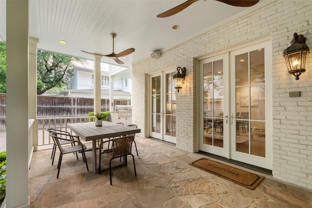 4561 Bordeaux Ave, Highland Park, TX 75205 - view of patio / terrace featuring ceiling fan, french doors, outdoor dining space, and exterior kitchen