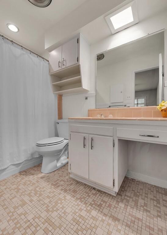 2832 Wooded Acres Dr, Waco, TX 76710 - bathroom featuring toilet, vanity, and shower / tub combo with curtain