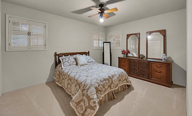 2832 Wooded Acres Dr, Waco, TX 76710 - carpeted bedroom featuring baseboards and a ceiling fan