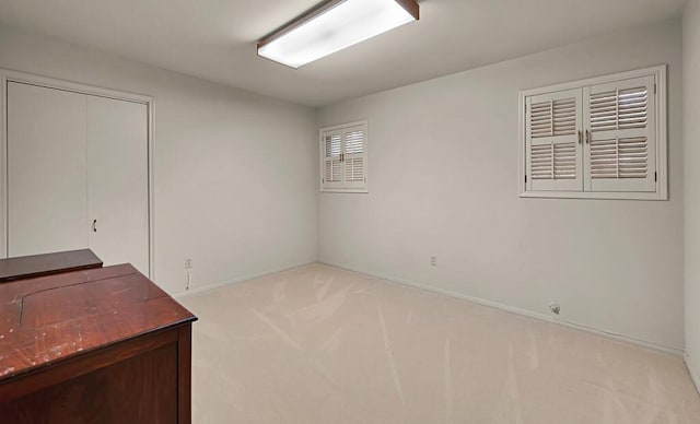2832 Wooded Acres Dr, Waco, TX 76710 - unfurnished bedroom featuring carpet, baseboards, and a closet