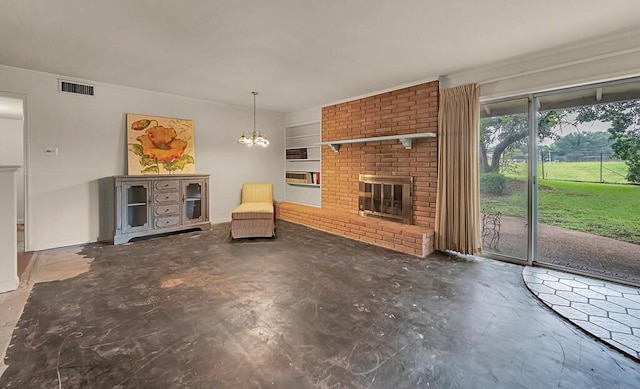 2832 Wooded Acres Dr, Waco, TX 76710 - unfurnished living room featuring crown molding, a fireplace, concrete floors, a chandelier, and built in shelves