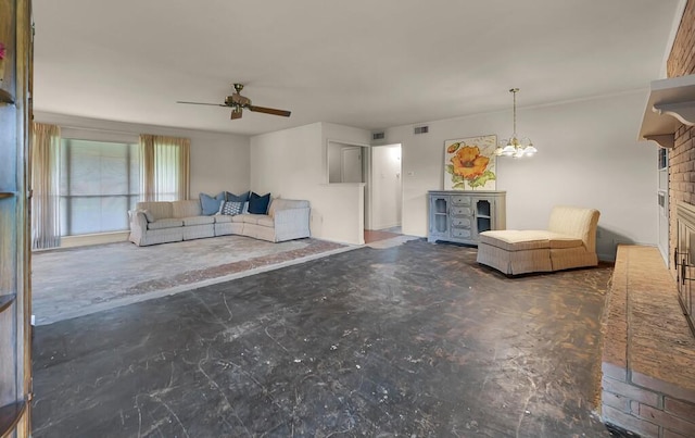 2832 Wooded Acres Dr, Waco, TX 76710 - living area with a fireplace, ceiling fan, a chandelier, and concrete flooring