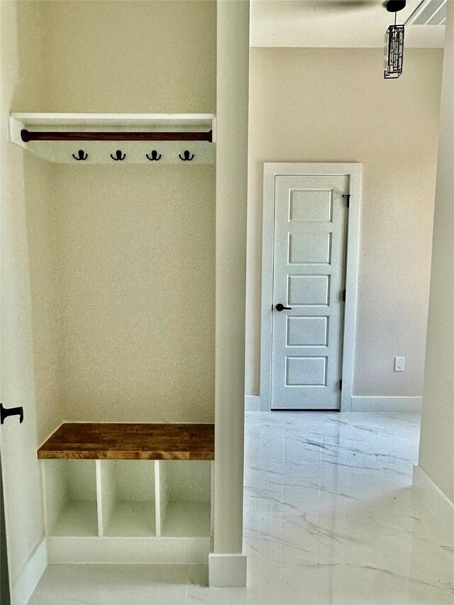 2815 Pall Mall Ave, Dallas, TX 75241 - full bathroom with marble look tile flooring, double vanity, baseboards, and a spacious closet