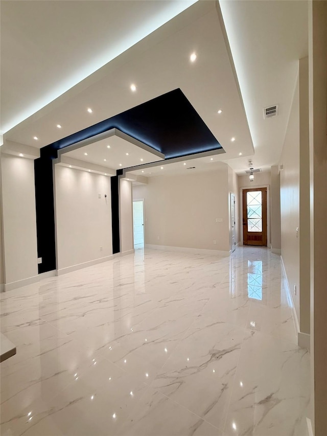 2815 Pall Mall Ave, Dallas, TX 75241 - kitchen featuring appliances with stainless steel finishes, a sink, light marble finish flooring, a kitchen island, and baseboards
