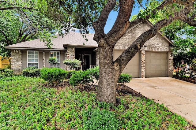 7536 Meadow Creek Dr, Fort Worth, TX 76123 - ranch-style house with a garage, driveway, brick siding, and a shingled roof