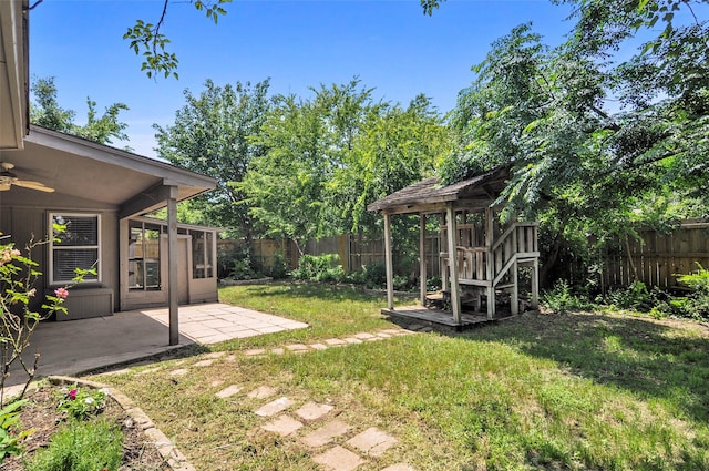 7536 Meadow Creek Dr, Fort Worth, TX 76123 - view of yard featuring ceiling fan and a patio area