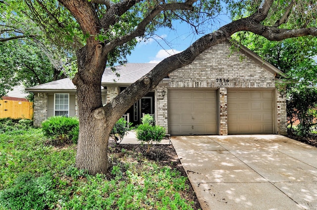 7536 Meadow Creek Dr, Fort Worth, TX 76123 - view of front of house with an attached garage, brick siding, and concrete driveway