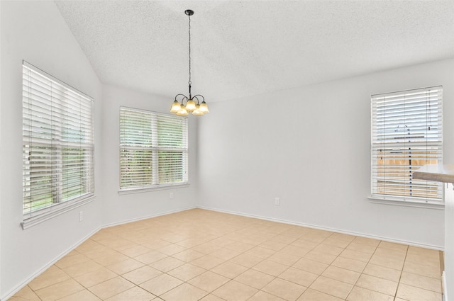 7536 Meadow Creek Dr, Fort Worth, TX 76123 - empty room featuring a textured ceiling, a chandelier, and baseboards