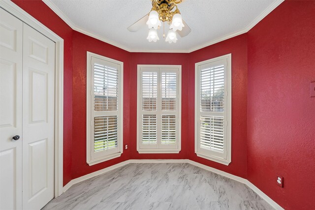 2008 Real Dr, Waco, TX 76712 - empty room featuring ceiling fan, ornamental molding, and baseboards