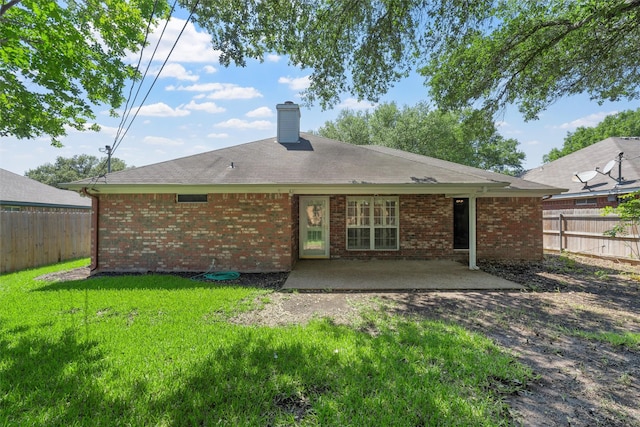 2008 Real Dr, Waco, TX 76712 - rear view of property with a patio area, a chimney, and brick siding