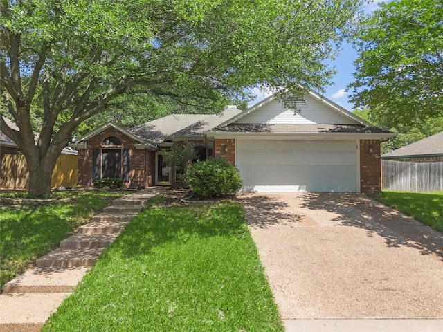 2008 Real Dr, Waco, TX 76712 - ranch-style house featuring brick siding, concrete driveway, and an attached garage