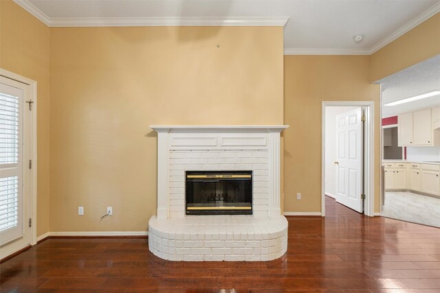 2008 Real Dr, Waco, TX 76712 - unfurnished living room featuring wood finished floors, crown molding, a fireplace, and healthy amount of natural light