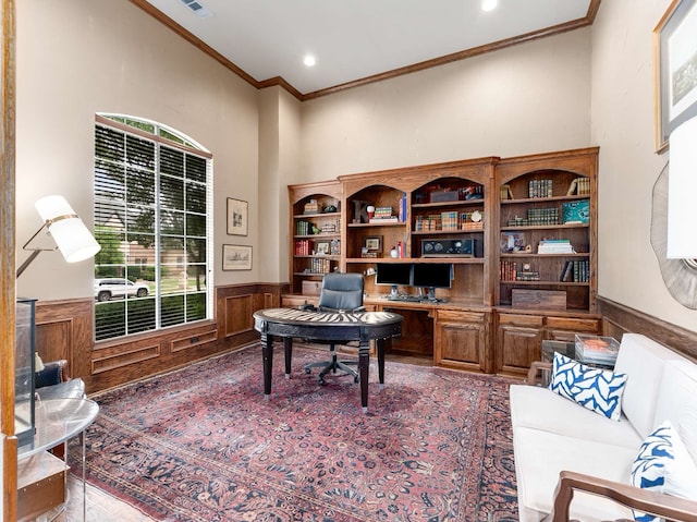 2830 Creekwood Ln, Prosper, TX 75078 - office featuring crown molding, healthy amount of natural light, a wainscoted wall, built in desk, and recessed lighting