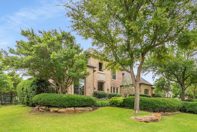 2830 Creekwood Ln, Prosper, TX 75078 - view of front of home with stone siding and a front yard