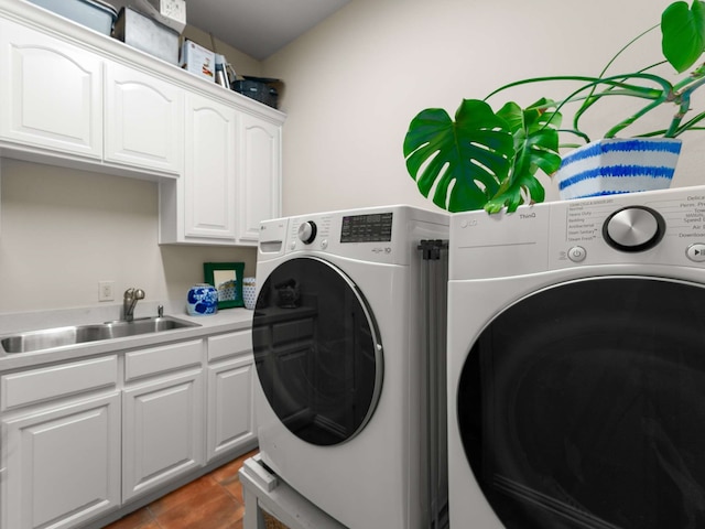 2830 Creekwood Ln, Prosper, TX 75078 - laundry room featuring washing machine and clothes dryer and cabinet space