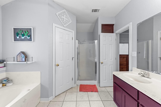 509 Sapphire Blvd, Hewitt, TX 76643 - full bath featuring vanity, a stall shower, a garden tub, and tile patterned flooring