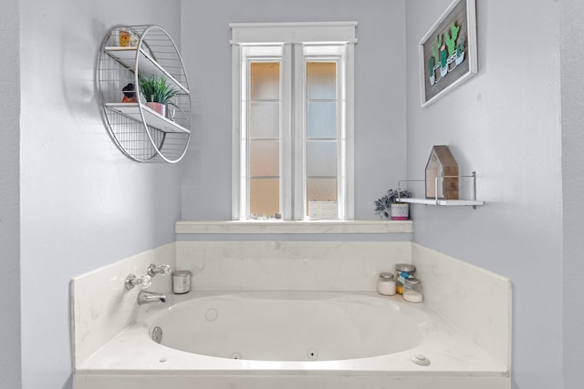 509 Sapphire Blvd, Hewitt, TX 76643 - bathroom with a tub with jets