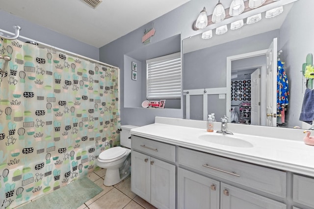 509 Sapphire Blvd, Hewitt, TX 76643 - full bathroom with tile patterned flooring, vanity, toilet, and shower / tub combo with curtain