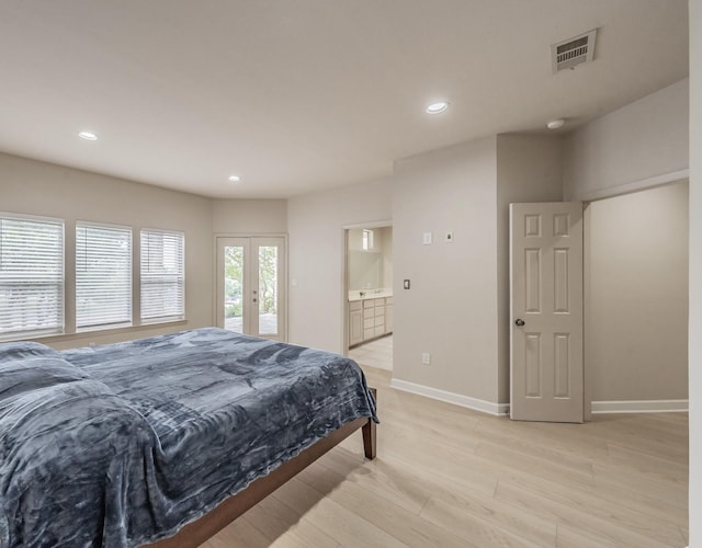11 Intrepid Cir, Rockwall, TX 75032 - bedroom featuring access to outside, light wood-type flooring, recessed lighting, baseboards, and connected bathroom