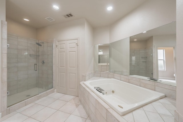 11 Intrepid Cir, Rockwall, TX 75032 - full bathroom featuring a tub with jets, a stall shower, recessed lighting, and tile patterned floors