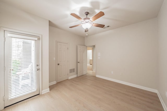 11 Intrepid Cir, Rockwall, TX 75032 - unfurnished bedroom with baseboards, light wood finished floors, and ceiling fan
