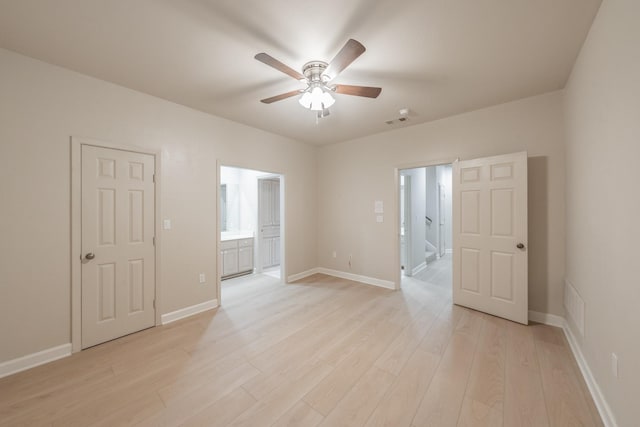 11 Intrepid Cir, Rockwall, TX 75032 - empty room with a ceiling fan, light wood finished floors, and baseboards