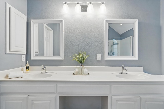 529 Colgate Dr, Allen, TX 75013 - bathroom featuring double vanity and a shower